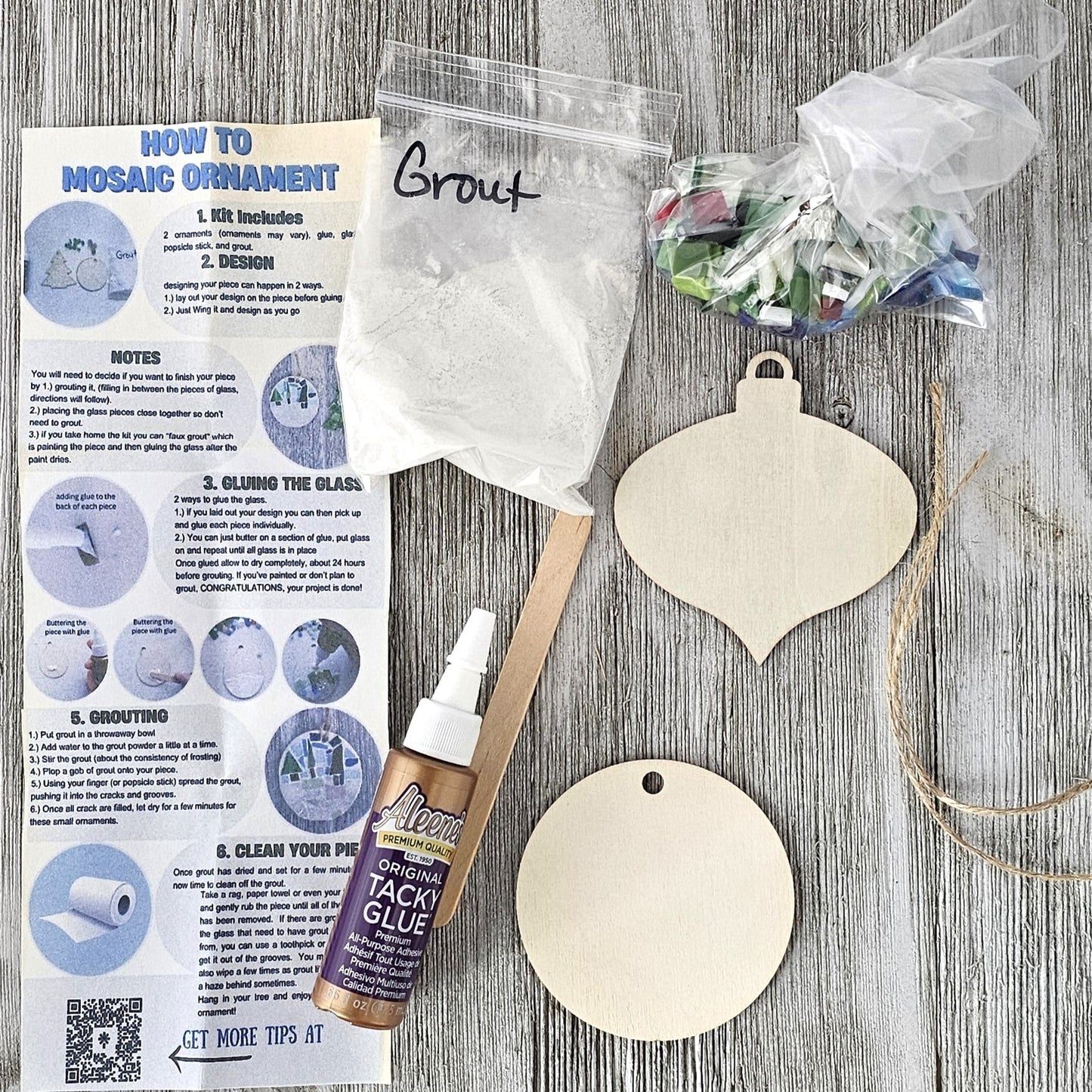 Craft kit with wooden ornaments, tacky glue, and instructions.  Complete kit to create 2 small 2.75" ornaments.