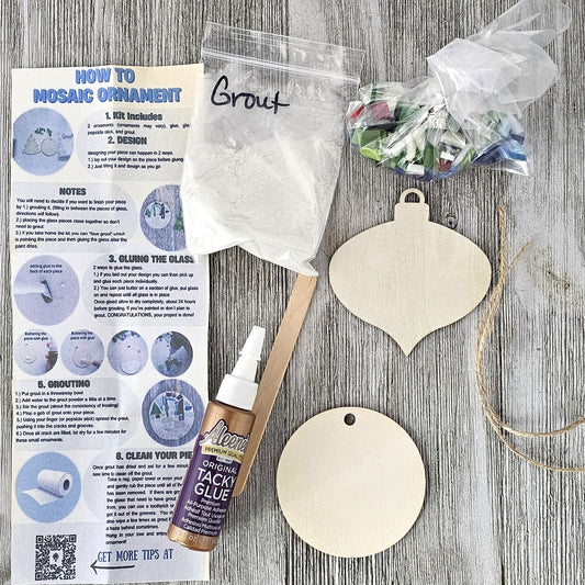 Craft kit with wooden ornaments, tacky glue, and instructions.  Complete kit to create 2 small 2.75" ornaments.
