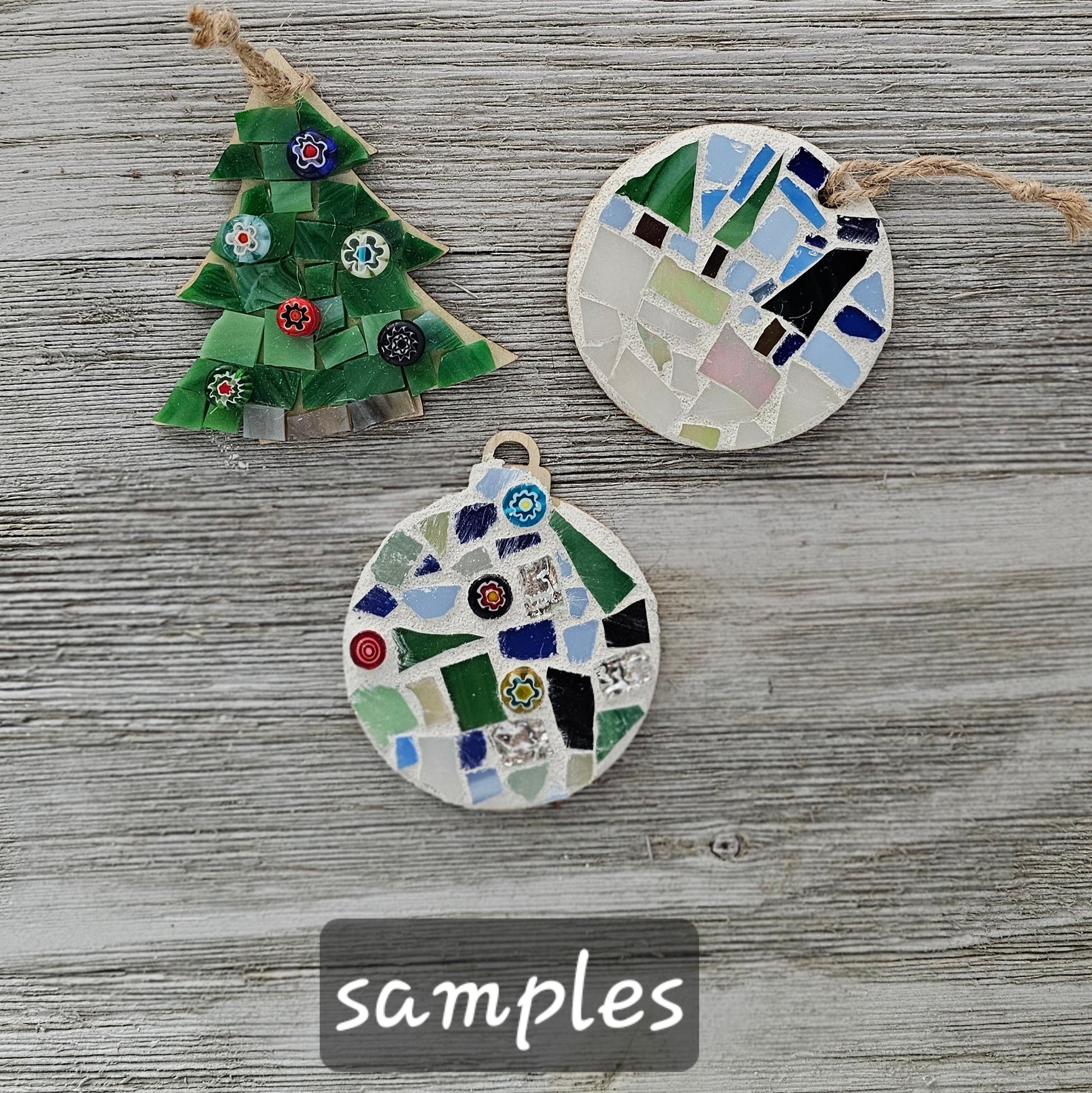 Three small (2.75") mosaic Christmas ornaments on a wooden surface with 'samples' label.