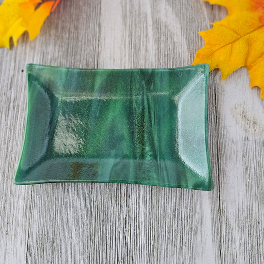 a 6x4 dish in varied shades of green that can be used as a candle holder, soap dish, spoon rest, or candy dish.